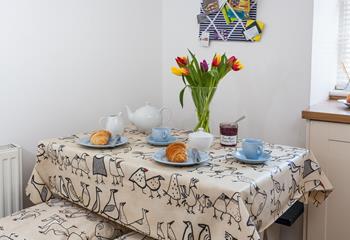 Start the day enjoying buttery pastries around the dining table.