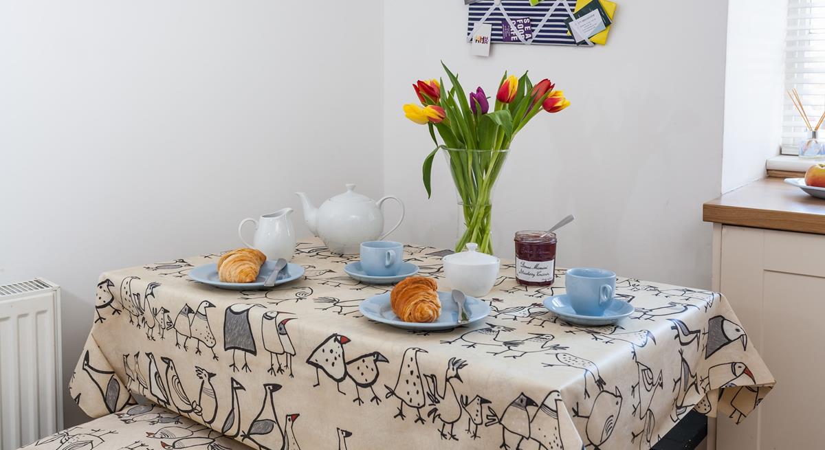 Start the day enjoying buttery pastries around the dining table.