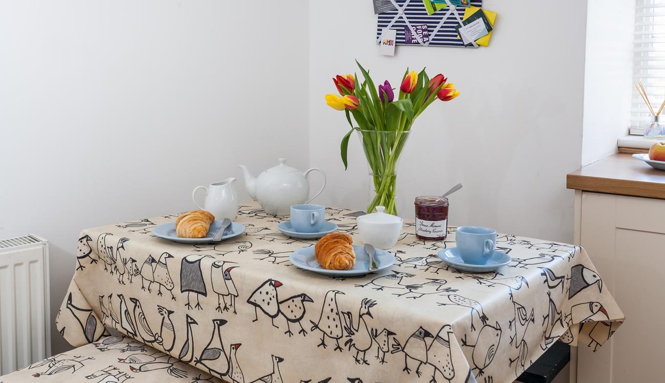 Start the day enjoying buttery pastries around the dining table.