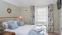 Rise early, tuck yourself away in the window seat with a hot drink and watch St Ives slowly wake up.