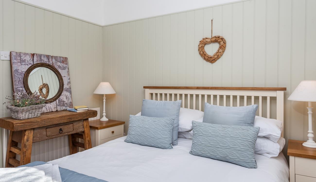 Bedroom 1 has a charming fairytale feel with thoughtfully selected decor to create a homely atmosphere.