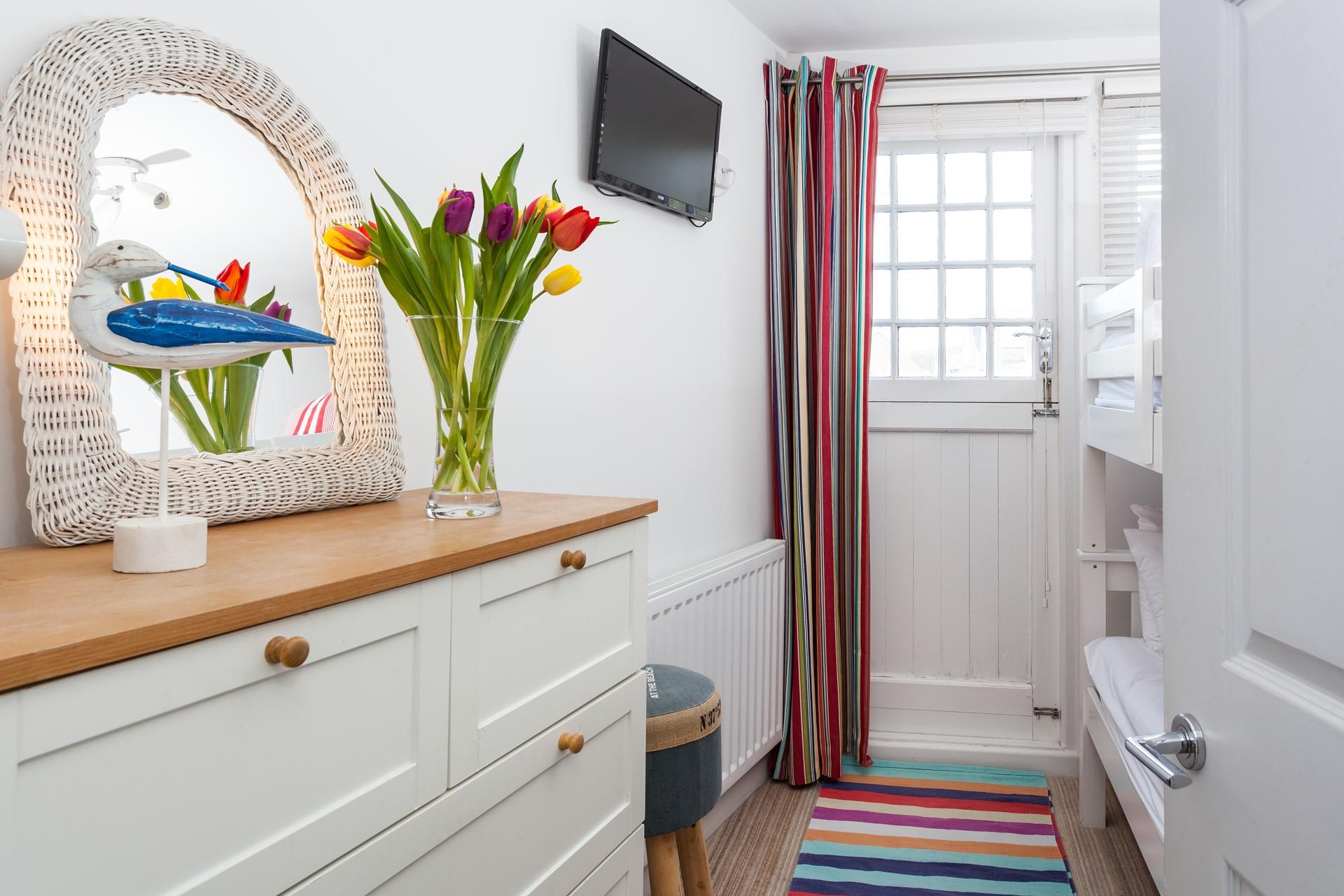 A TV in the second bedroom will help to keep the little ones entertained before you head off on your day's adventures.