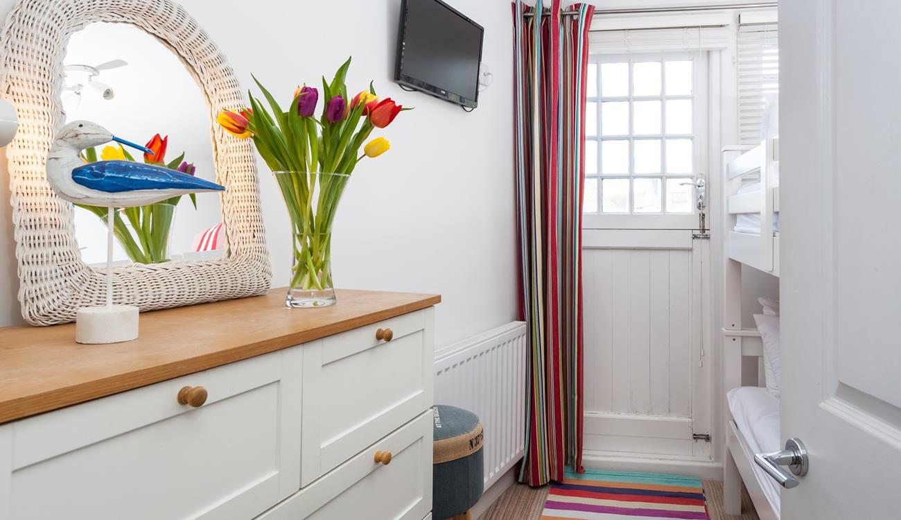 A TV in the second bedroom will help to keep the little ones entertained before you head off on your day's adventures.