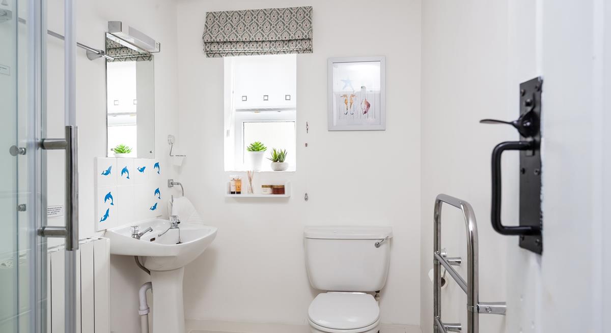 Wash off sandy toes in the shower after a day at Perranuthnoe Beach.