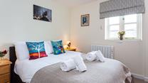 Sink into the soft sheets in the double bed and drift into a dreamy night's sleep.