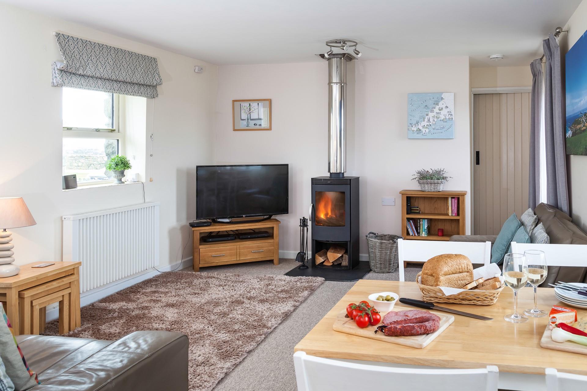 A woodburner allows you to stay cosy in the cooler months.