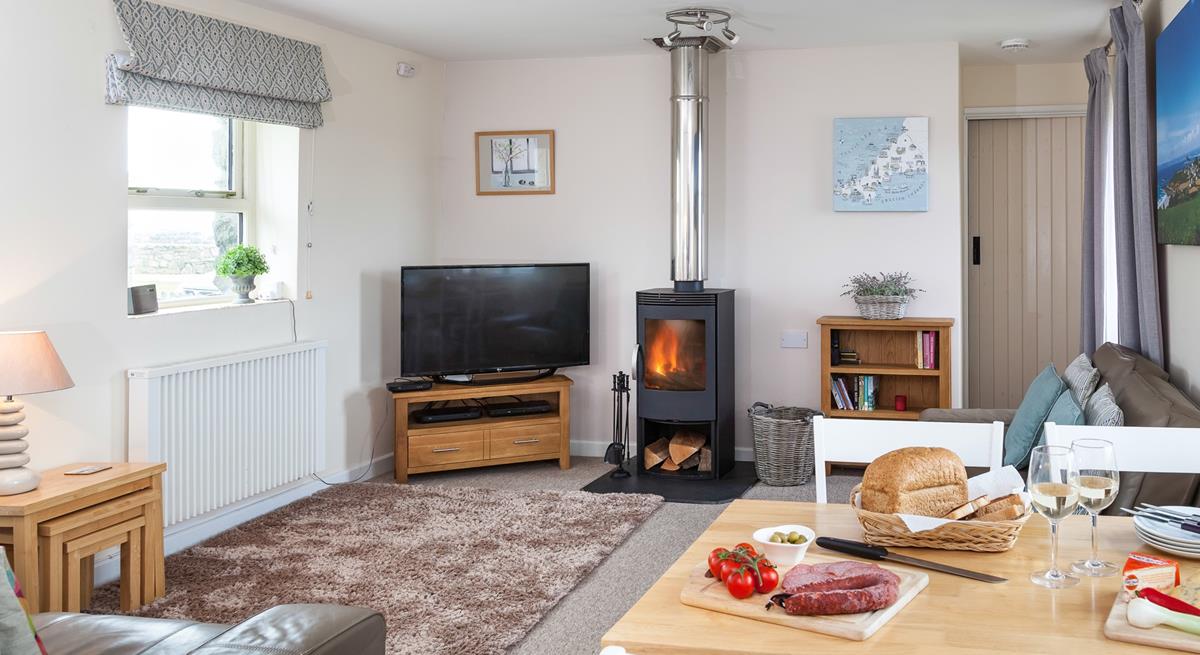 A woodburner allows you to stay cosy in the cooler months.