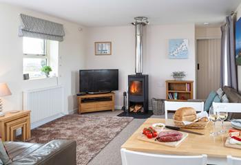 A woodburner allows you to stay cosy in the cooler months.