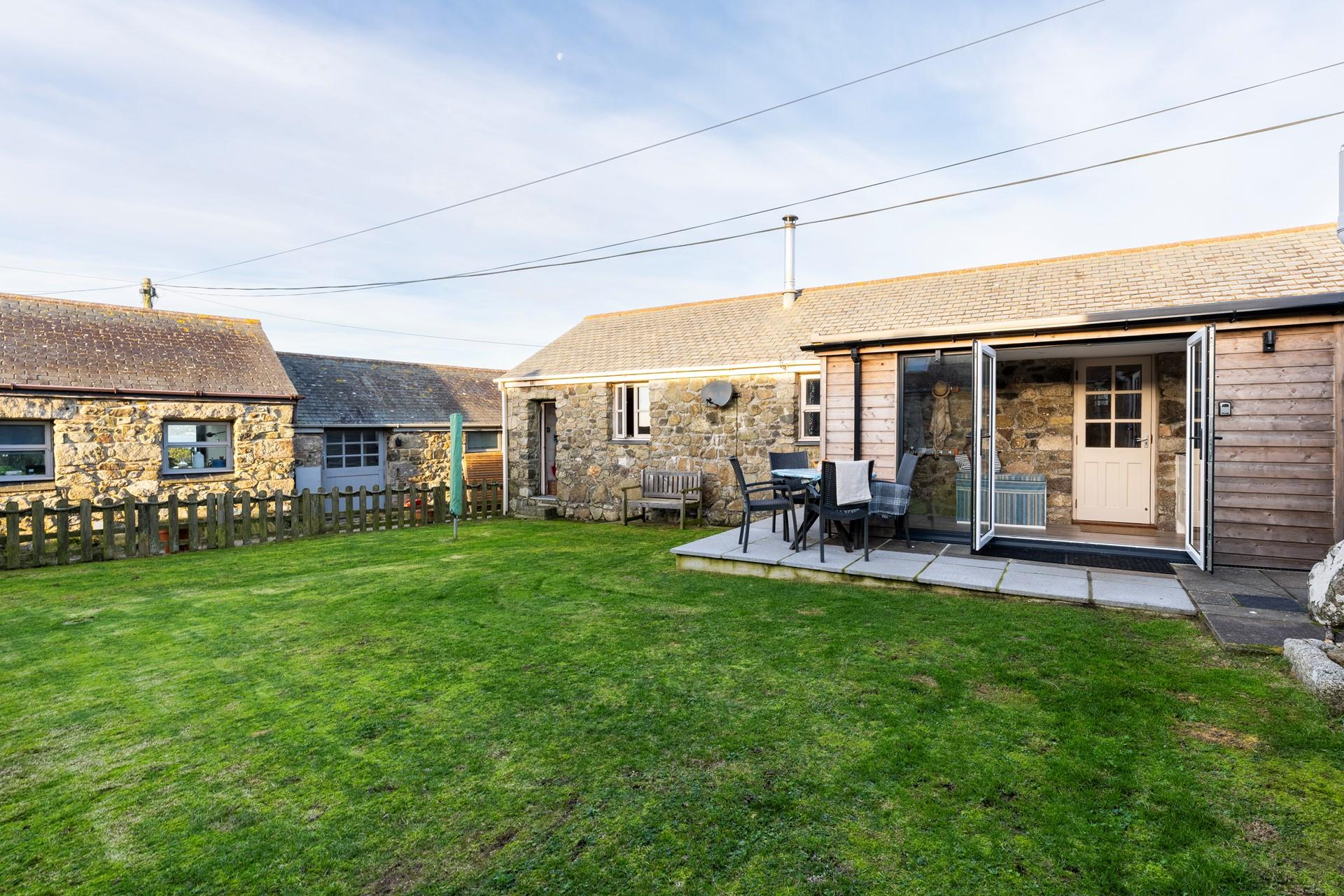 The large garden is perfect for watching your furry friends play.