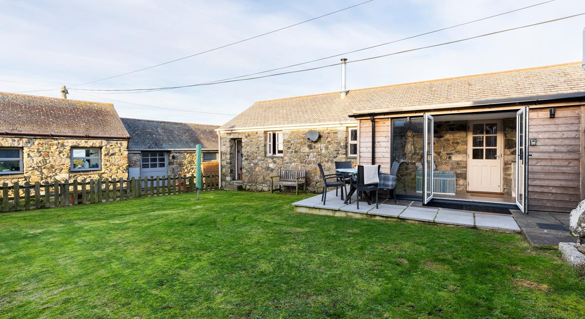 The large garden is perfect for watching your furry friends play.