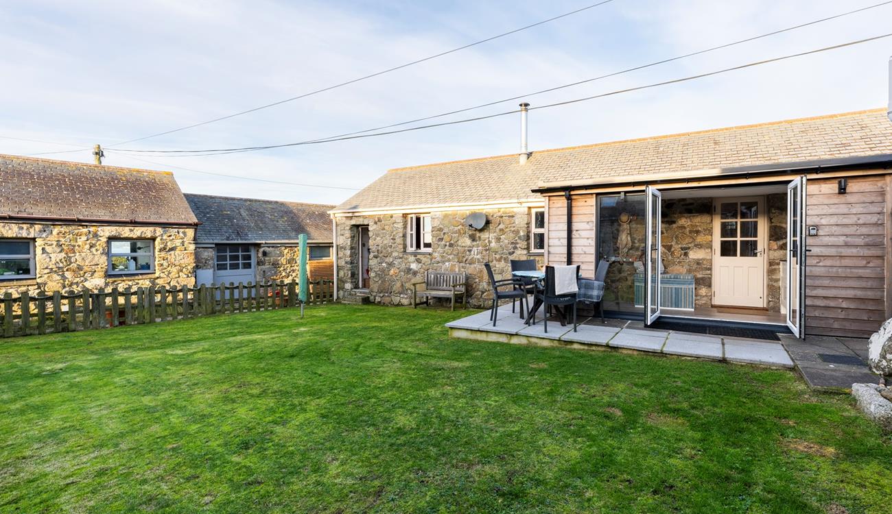 The large garden is perfect for watching your furry friends play.