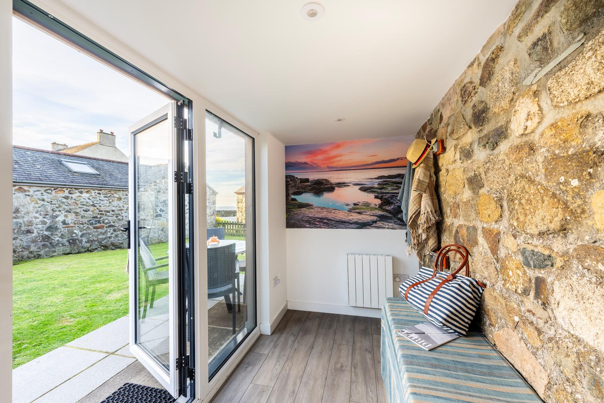 Open the patio doors and let the fresh breeze into the cosy abode.