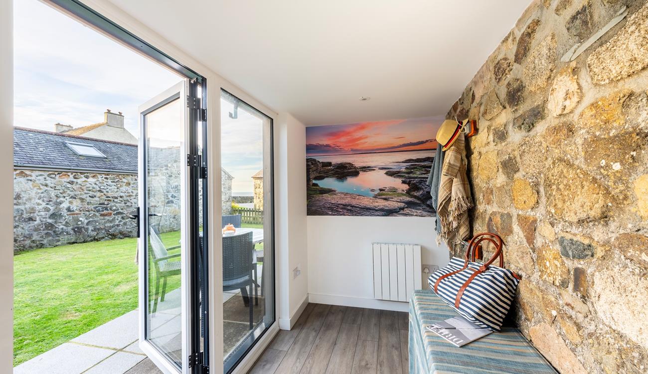 Open the patio doors and let the fresh breeze into the cosy abode.