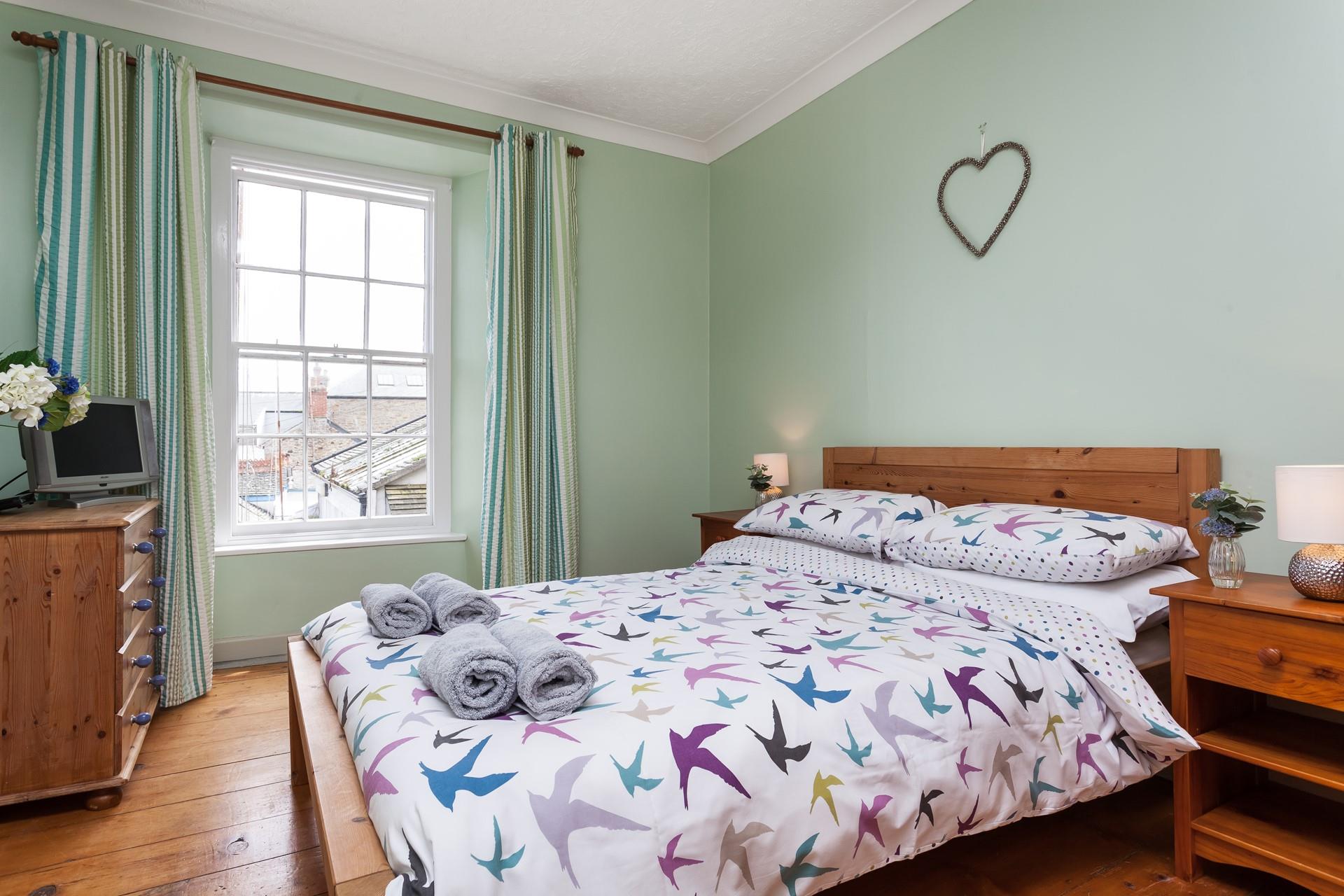 Throw open the curtains and enjoy pretty views of Mousehole. 