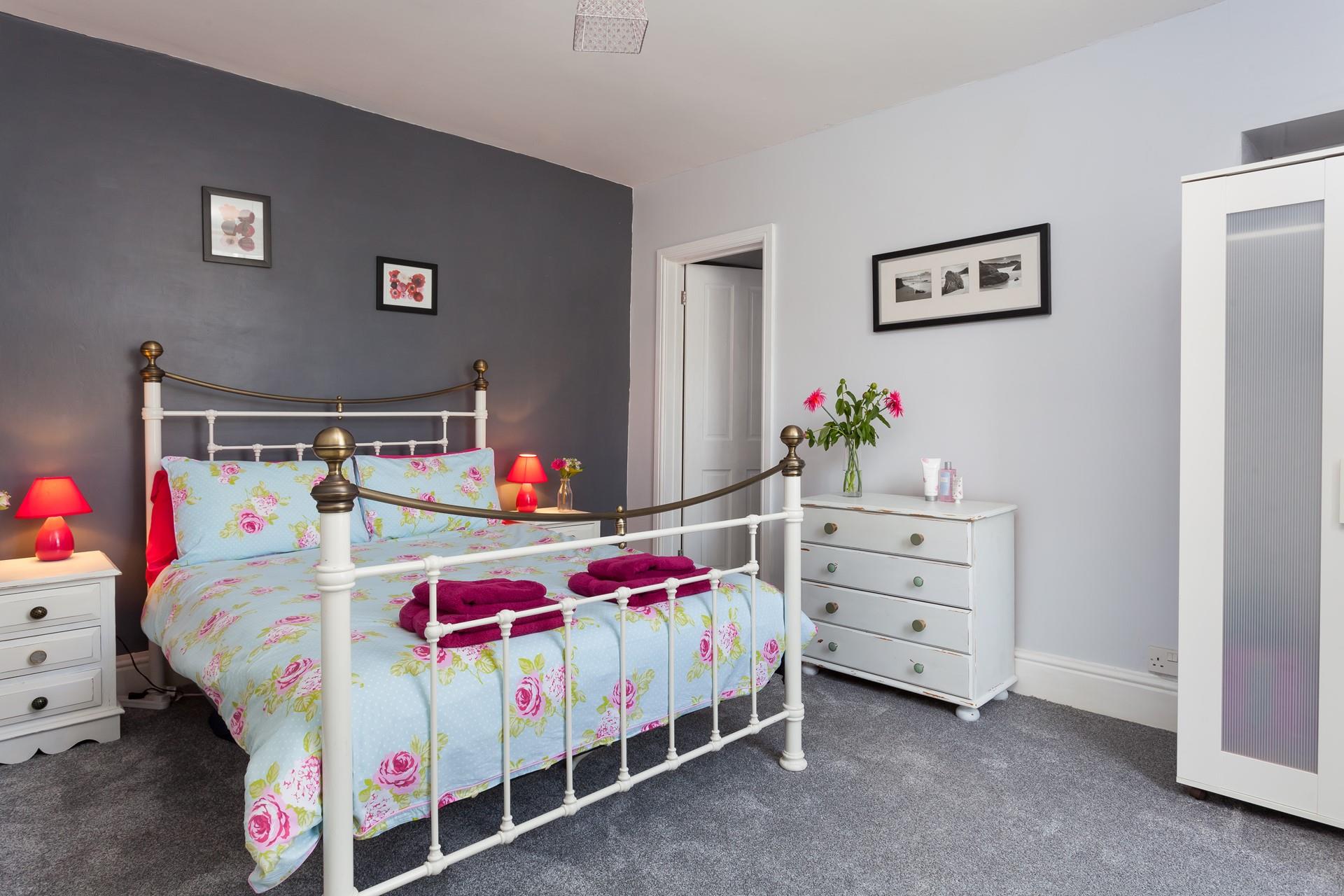 Snuggle up in the pretty bedroom and sleep soundly.