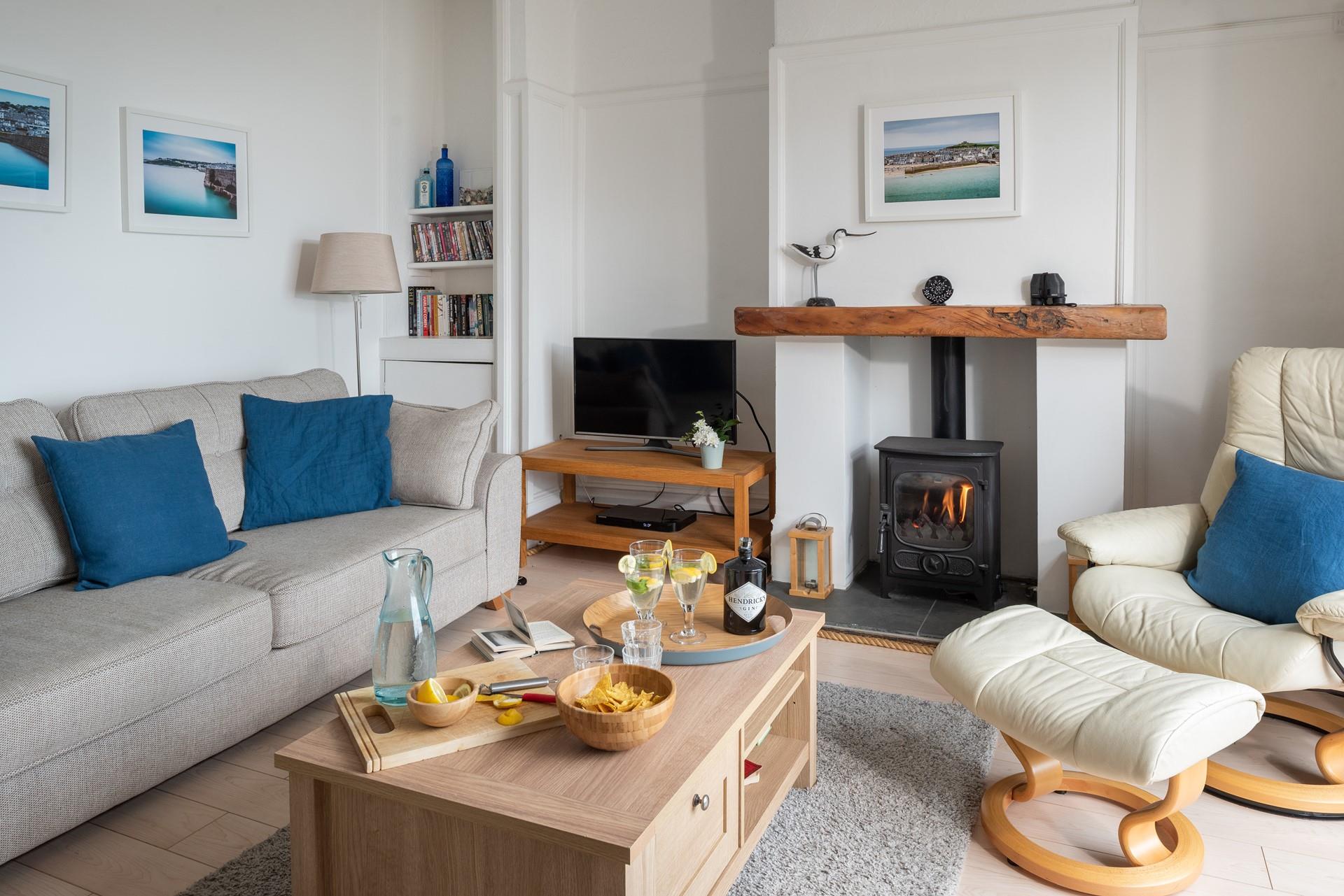 The sitting room is the perfect cosy space to snuggle up in the evenings with wine and nibbles.