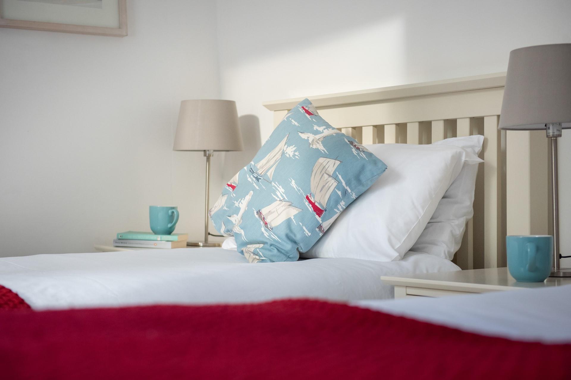 Crisp white linen awaits you for a dreamy night's slumber.