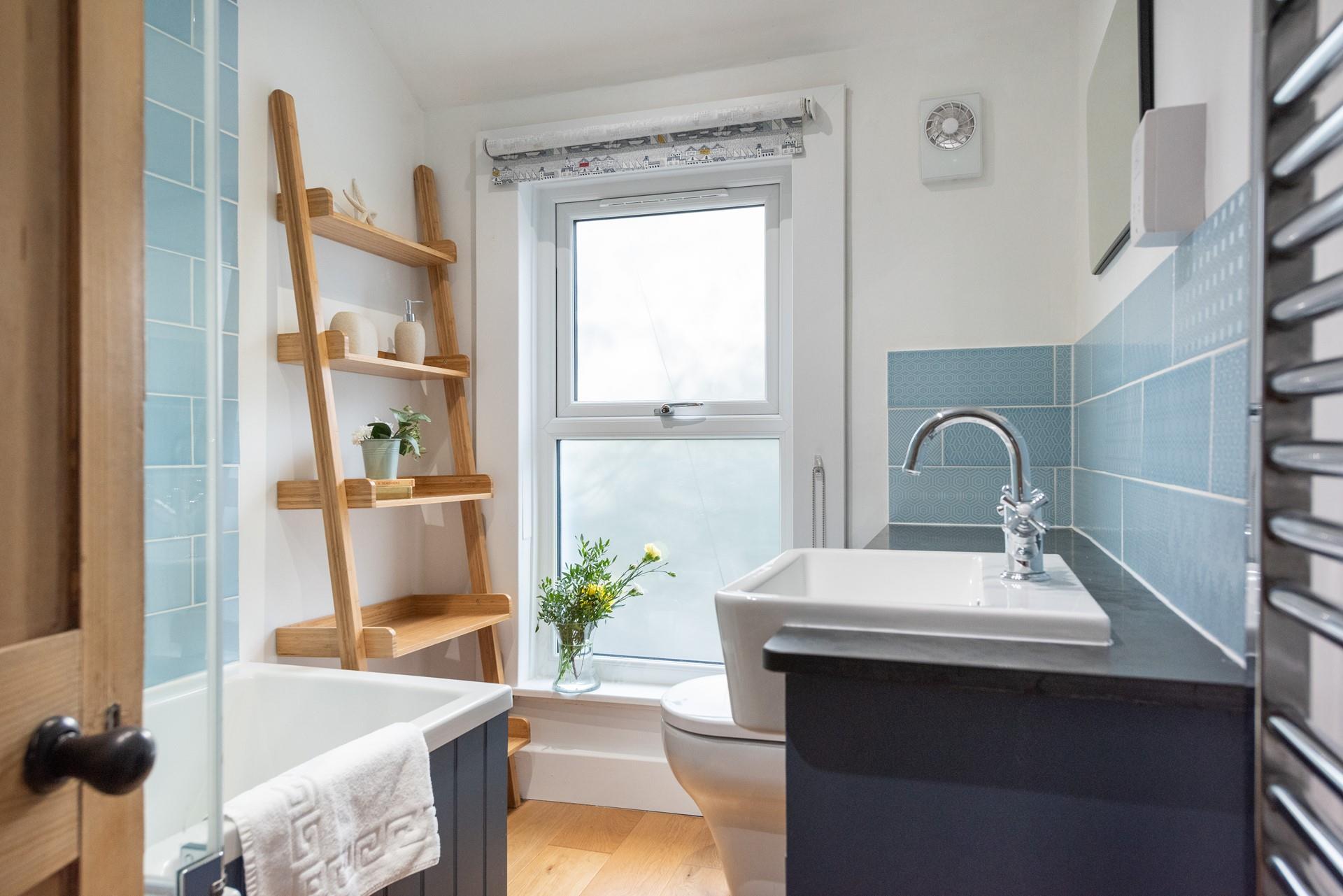 The family bathroom has a bath or shower to choose from.