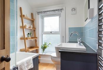 The family bathroom has a bath or shower to choose from.