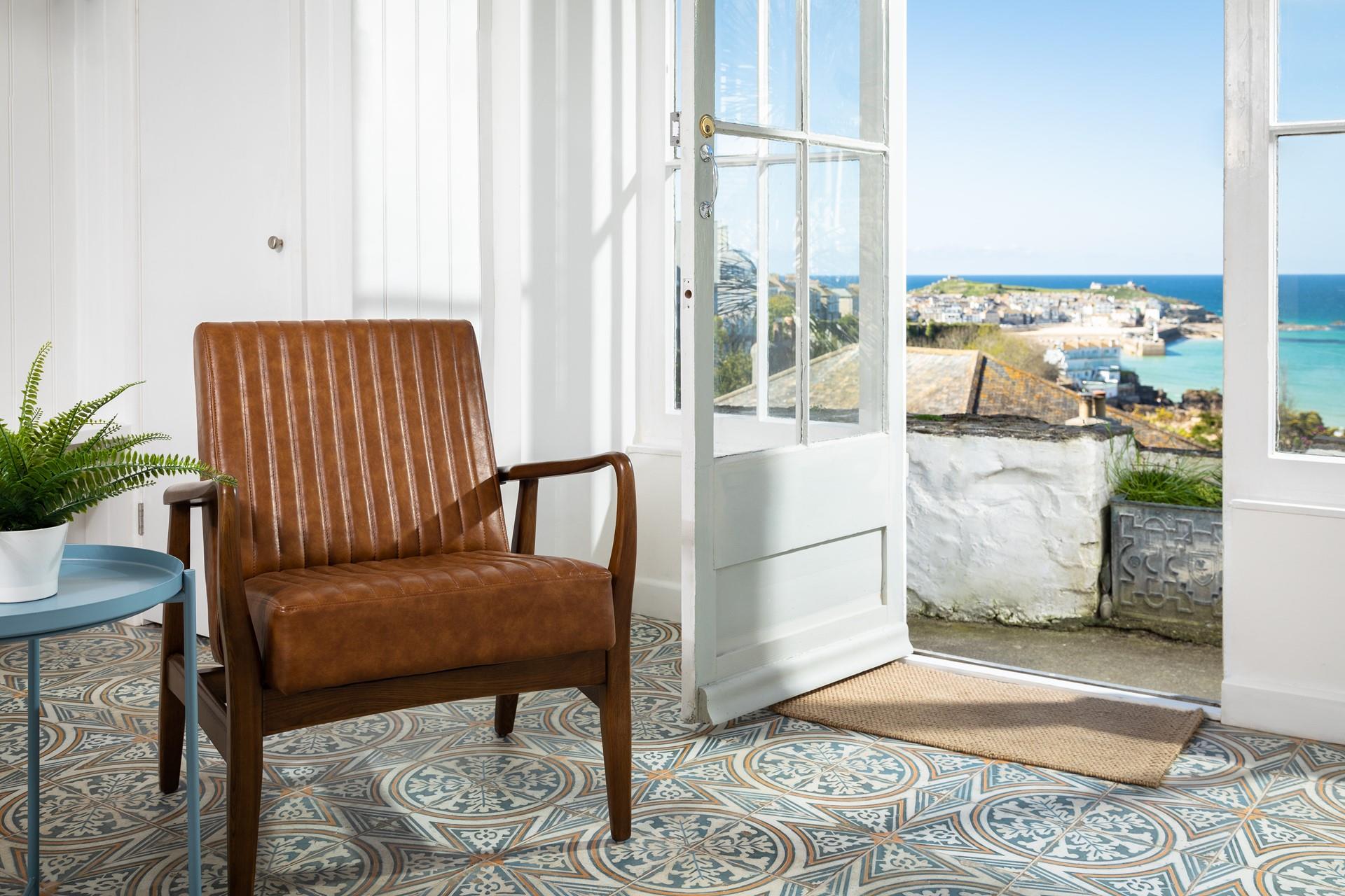The seating area in the kitchen/dining area is the perfect space to relax with a good book.