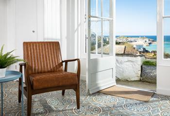 The seating area in the kitchen/dining area is the perfect space to relax with a good book.