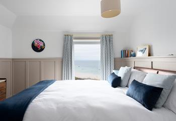 Bedroom 3 has a double bed with modern panelling creating a calming space to rest your head each night.