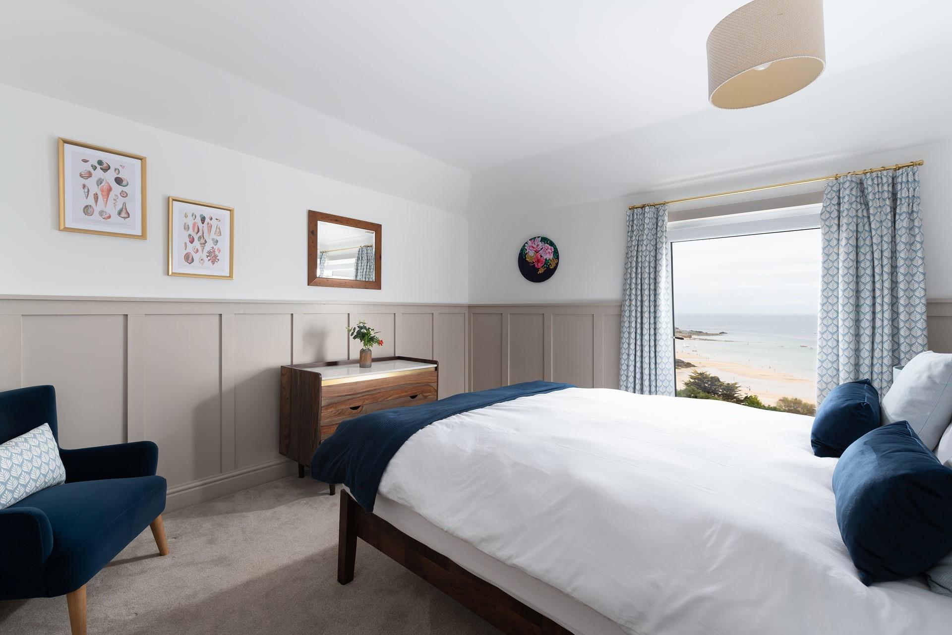 Stylish interiors complete this wonderful bedroom.