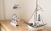We love the seaside decor throughout the cottage.  - Thumbnail Image