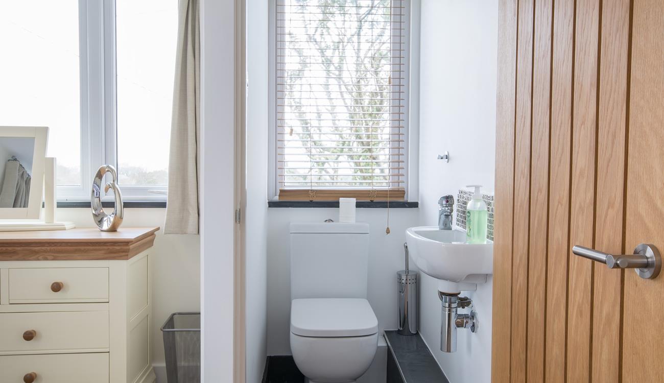 Bedroom 1 also benefits from its own cloakroom with WC and washbasin. 