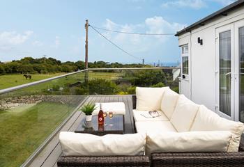 Spend time sharing holiday stories while enjoying the Cornish countryside from your secluded balcony. 