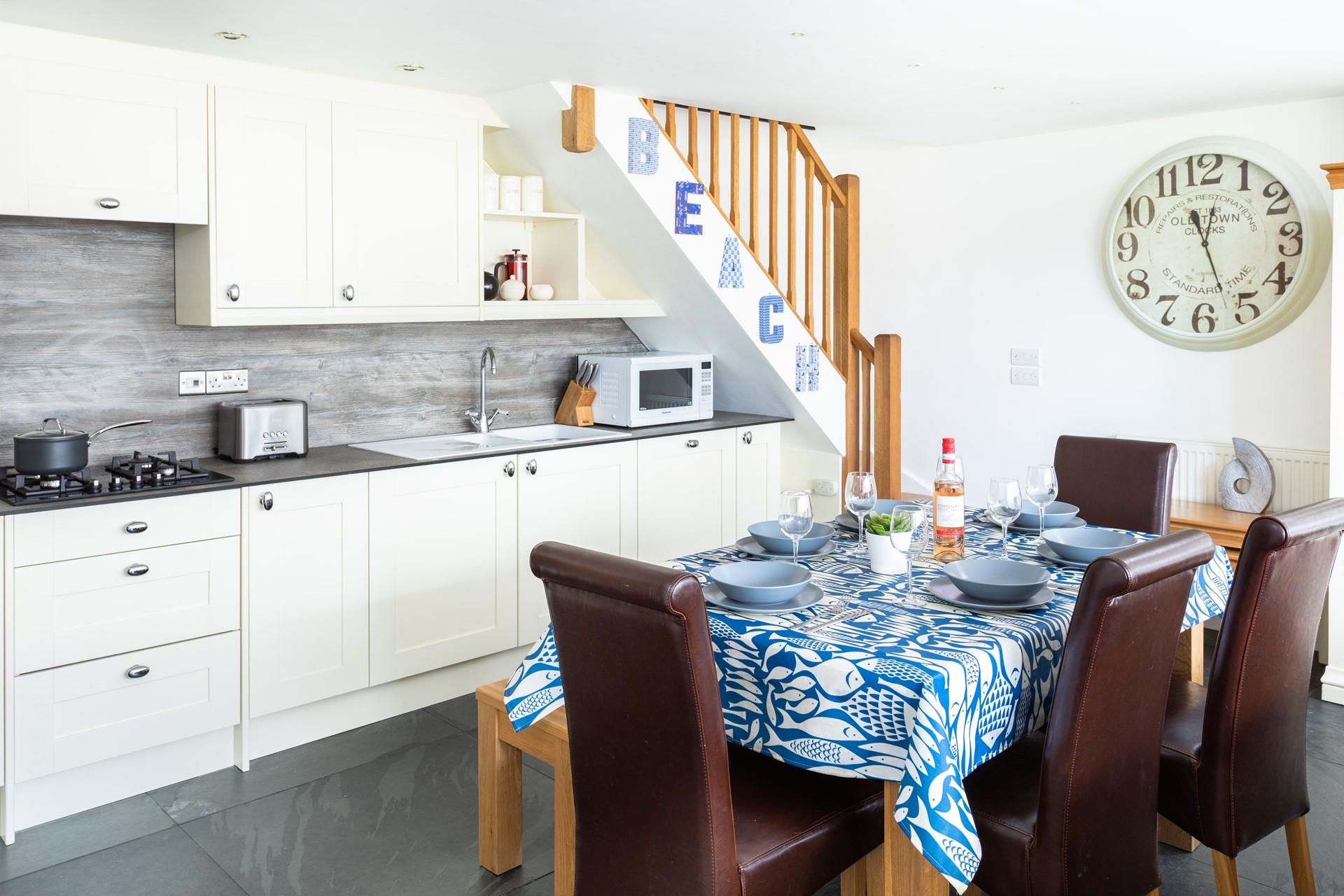 The open plan kitchen-diner is light and spacious.