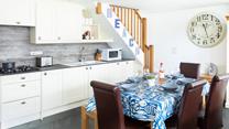 The open plan kitchen-diner is light and spacious.