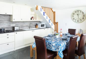 The open plan kitchen-diner is light and spacious.