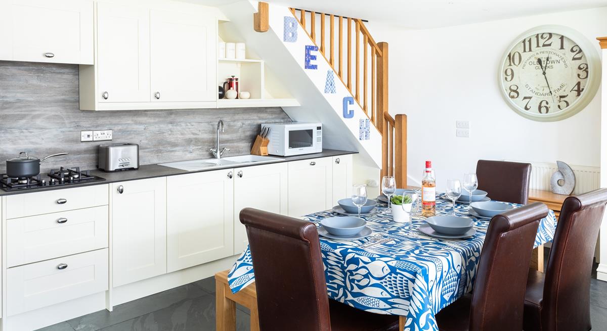 The open plan kitchen-diner is light and spacious.