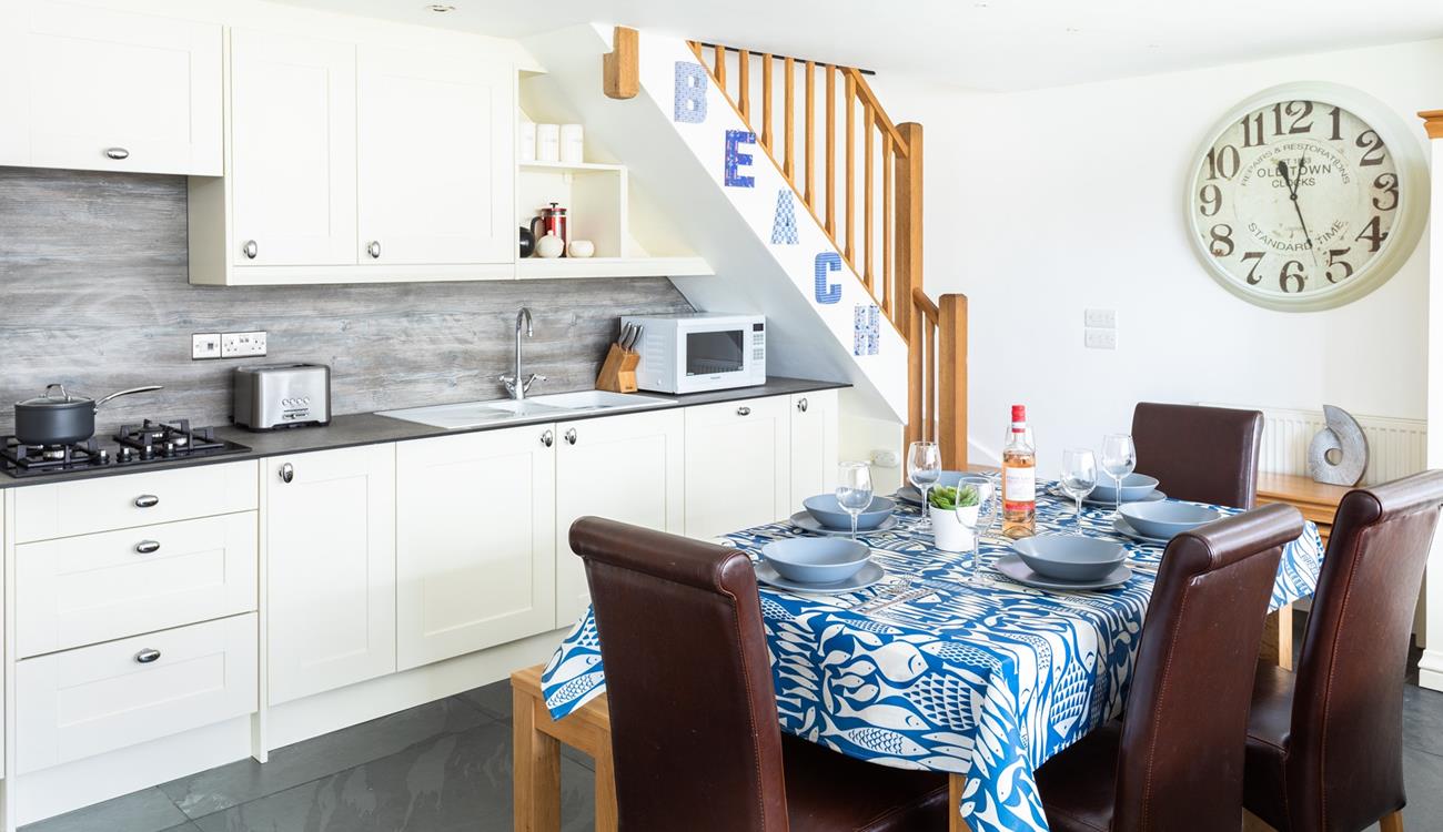 The open plan kitchen-diner is light and spacious.