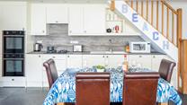 The coastal decor reflects the property's proximity to the sea. 