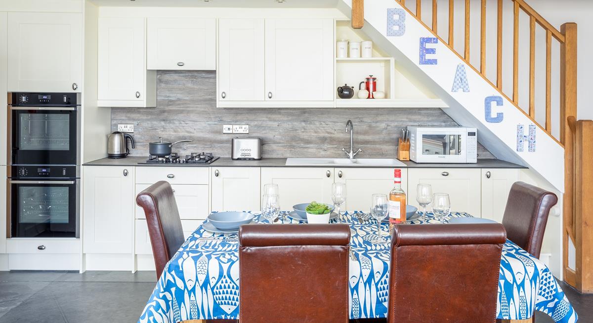 The coastal decor reflects the property's proximity to the sea. 