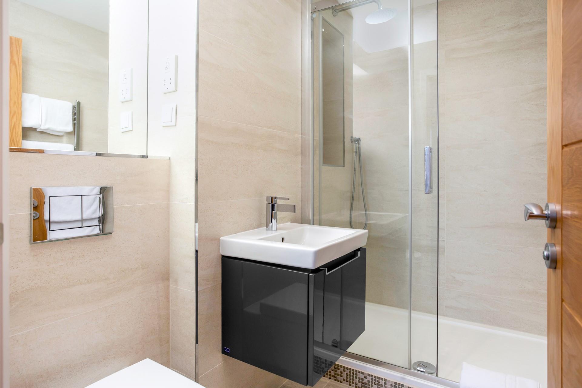 Wash off sandy toes in the shower after a day spent on Porthminster Beach.