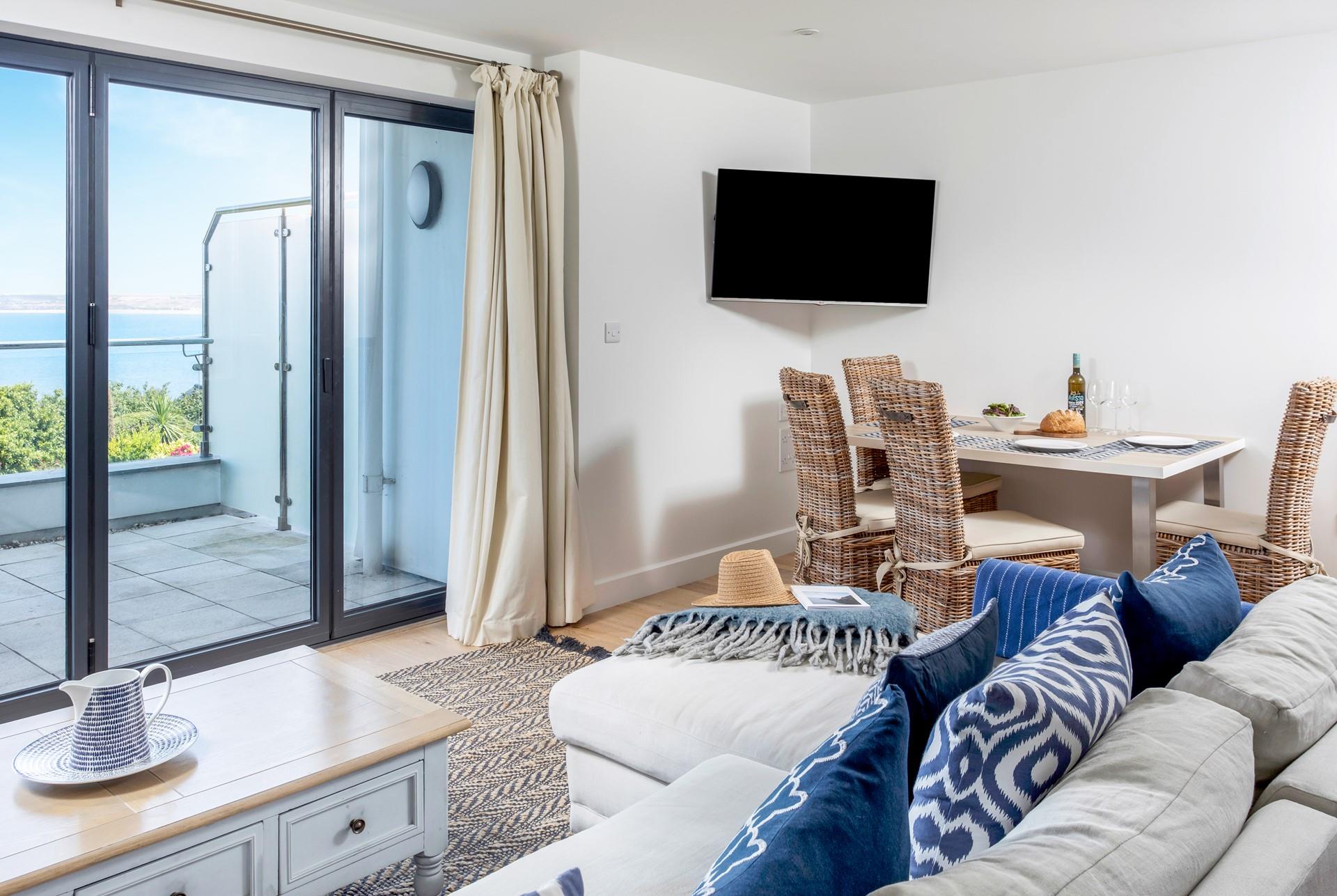 Dinner is served with the Cornish coast as your backdrop.