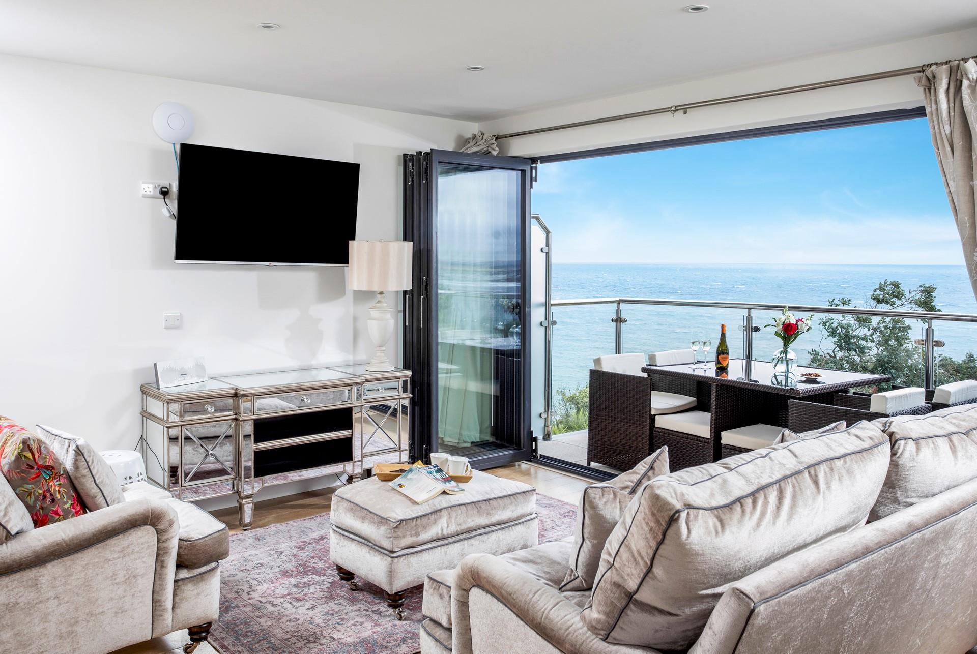 Breathtaking views and elegant seating make this the perfect space to relax.