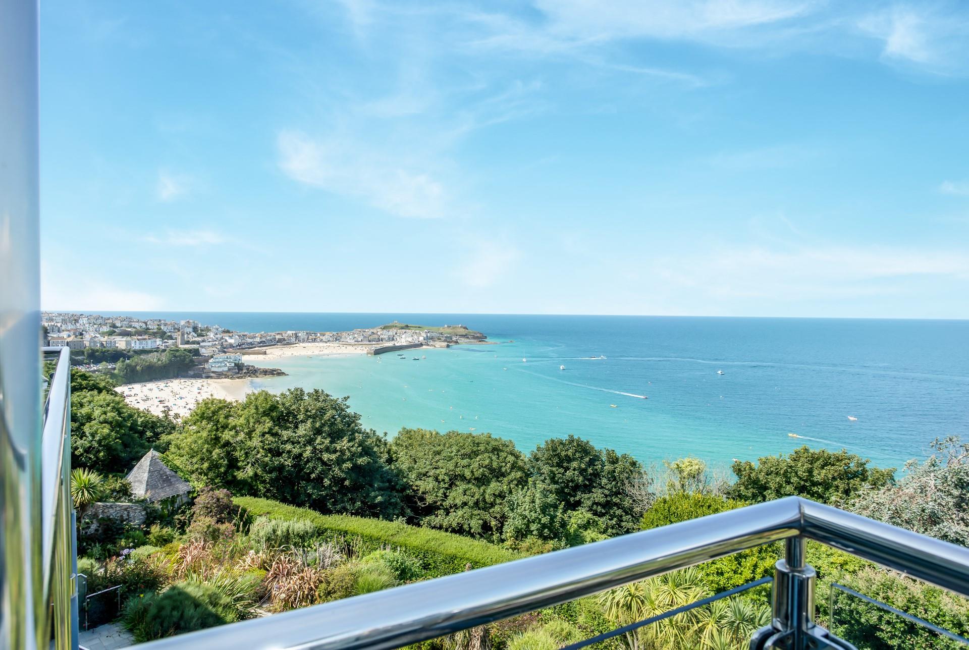 While away the hours on the balcony watching boats sail by, as the tide ebbs and flows.