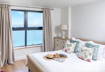 Snuggle into the king size bed, and gaze out to sea.