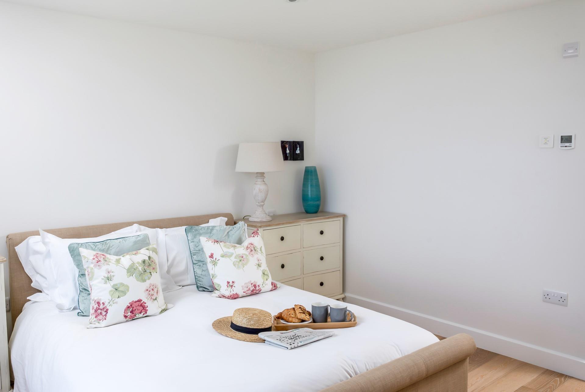 The beautiful furnishings make for a cosy bedroom.