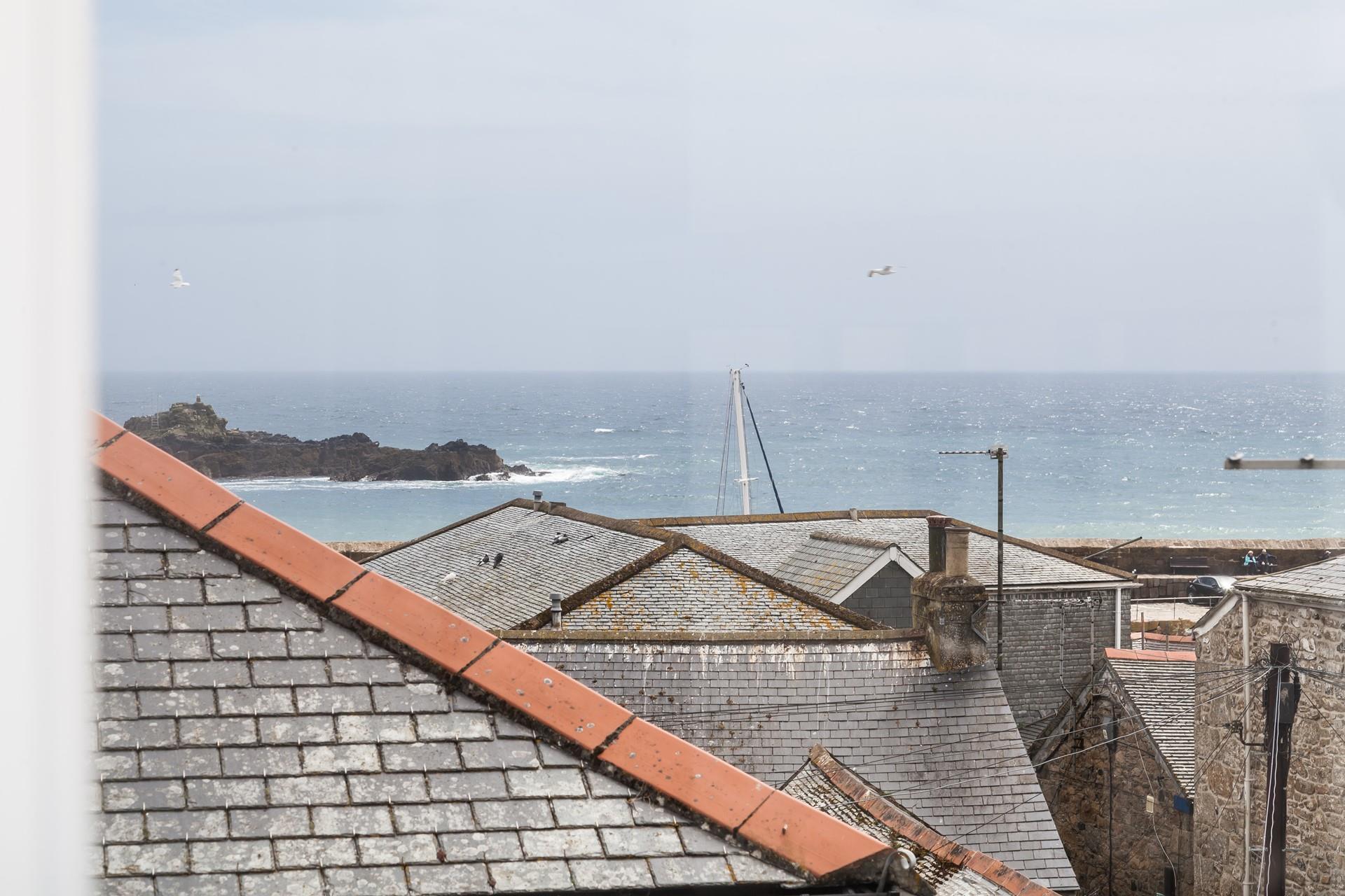 Rooftop views out to sea and across Mounts Bay. 