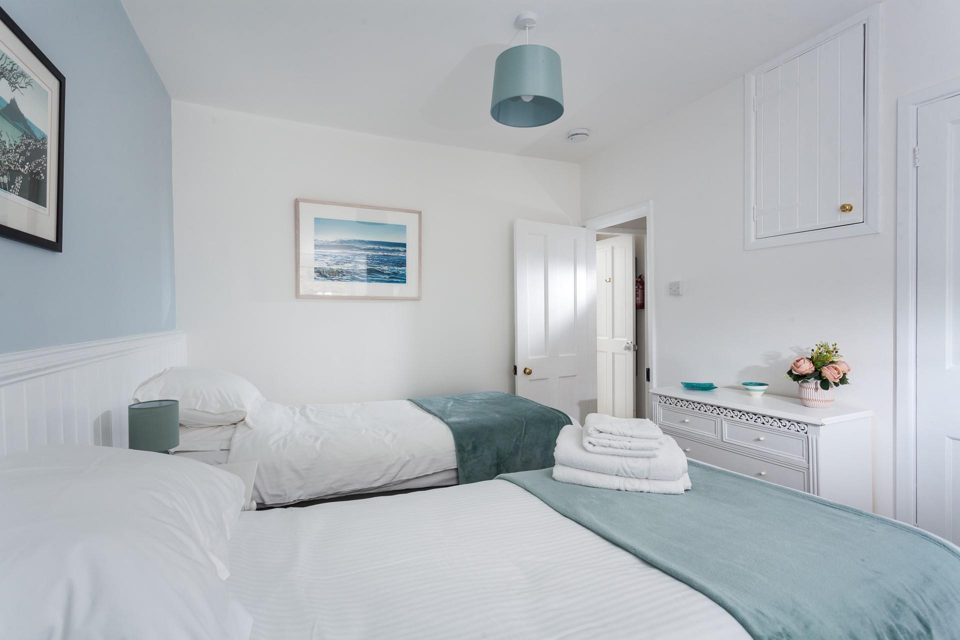 Tuck the little ones into bed, exhausted after a day of playing on the beach.