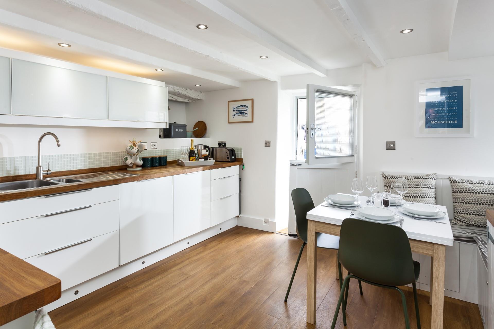 Kitchen and dining table on the lower ground floor.
