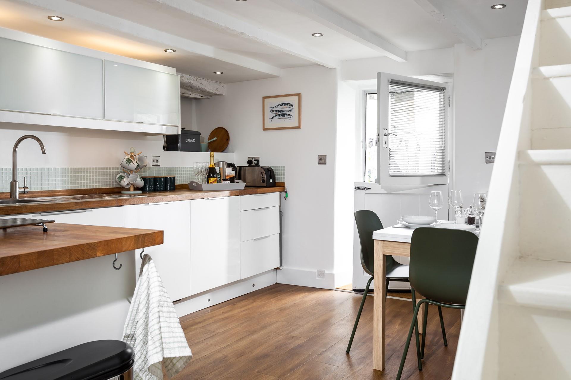 The kitchen is well-equipped for cooking together.
