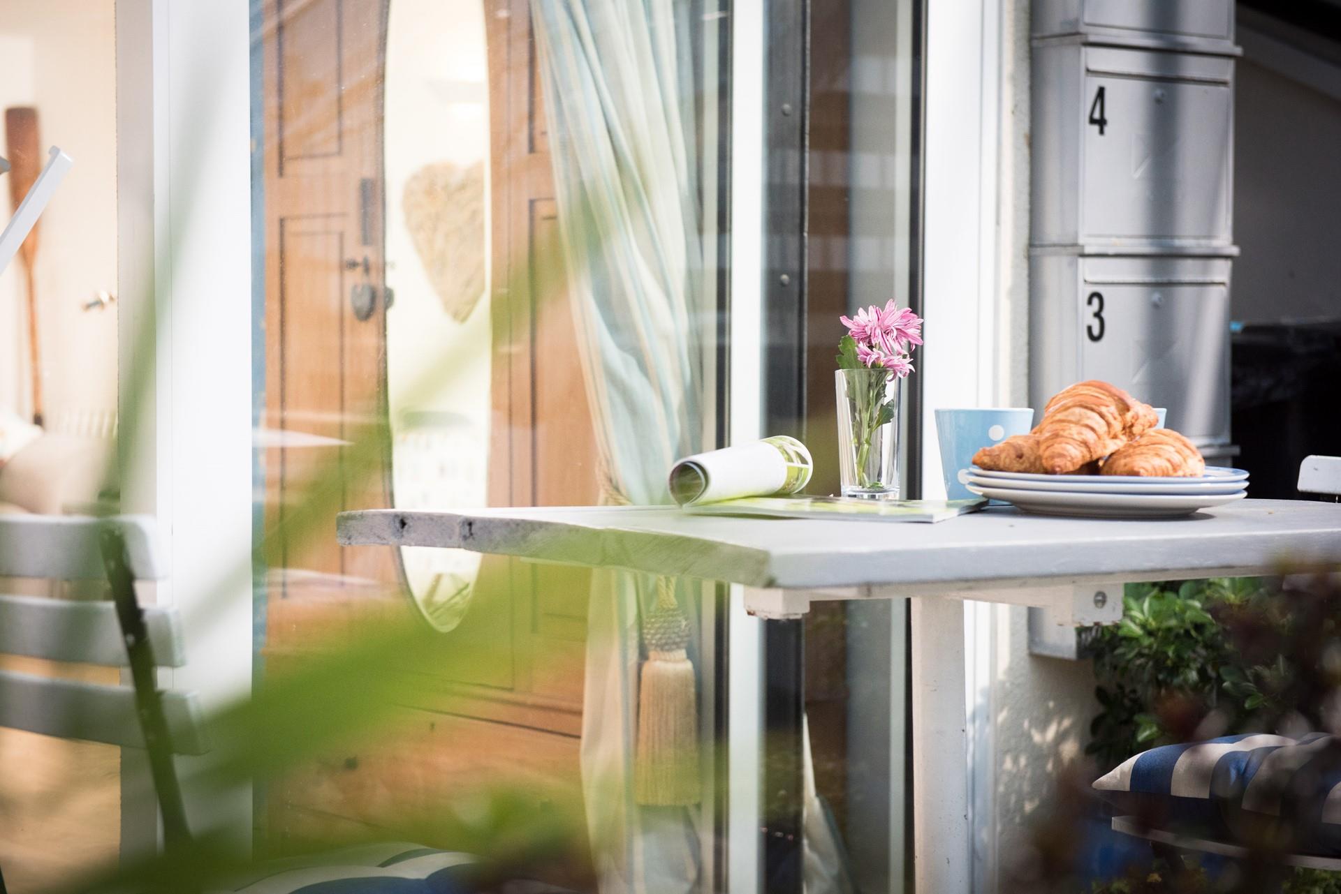 Start your day here or catch the last of the evening sun with a glass of something chilled in hand.