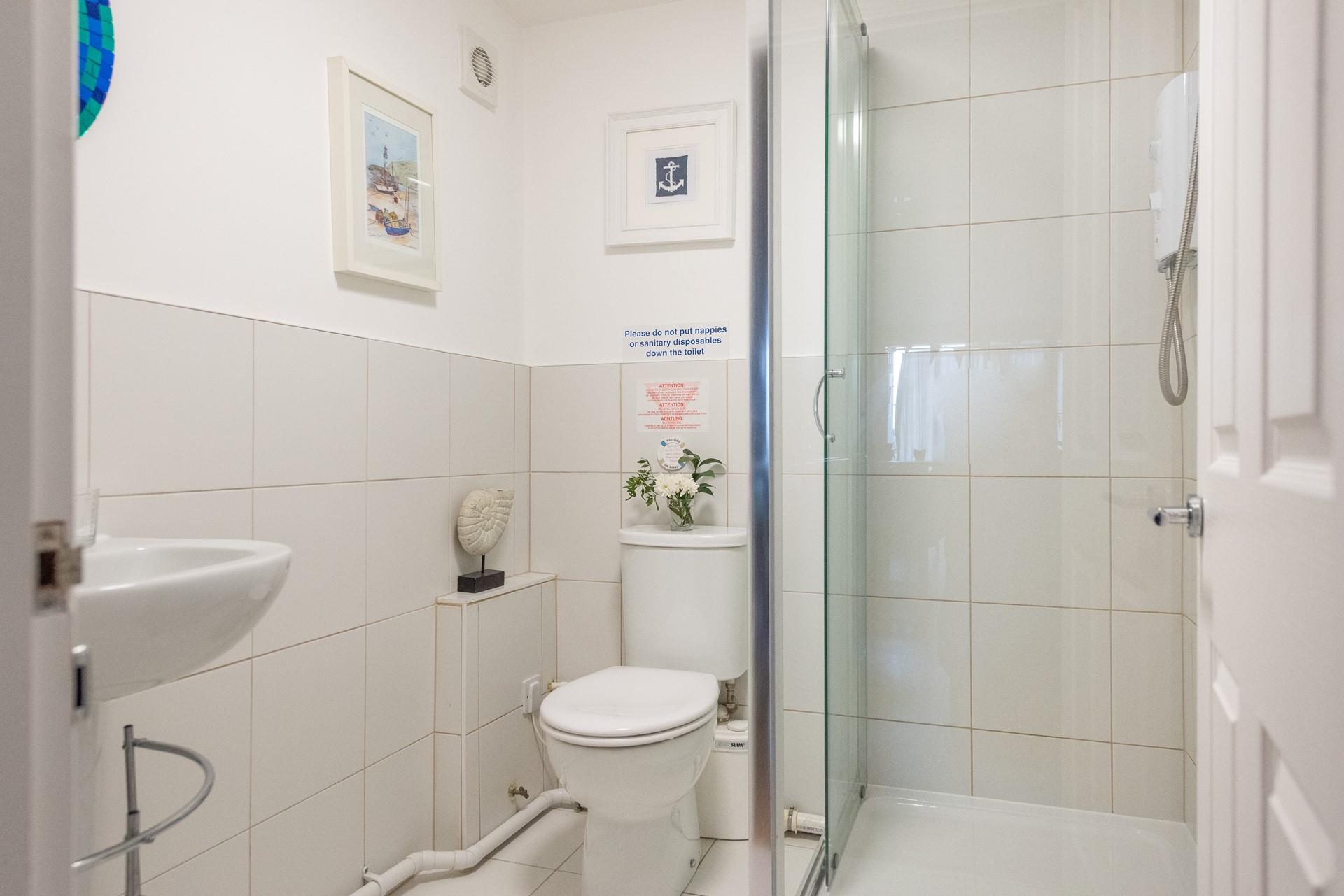 Freshen up after a day at the beach in the lovely shower room. 