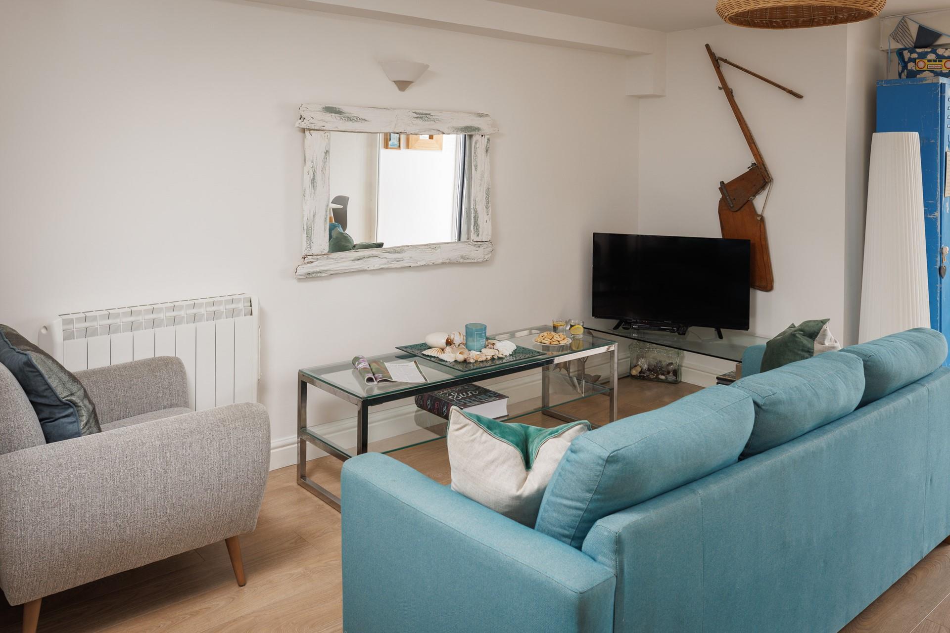 Unwind during the evening in the comfy sitting room.